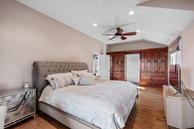 bedroom featuring recessed lighting, light wood finished floors, ceiling fan, and lofted ceiling