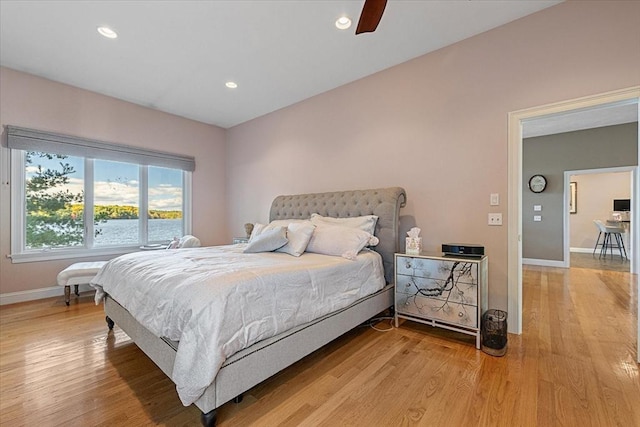 bedroom with recessed lighting, baseboards, ceiling fan, and light wood-style flooring