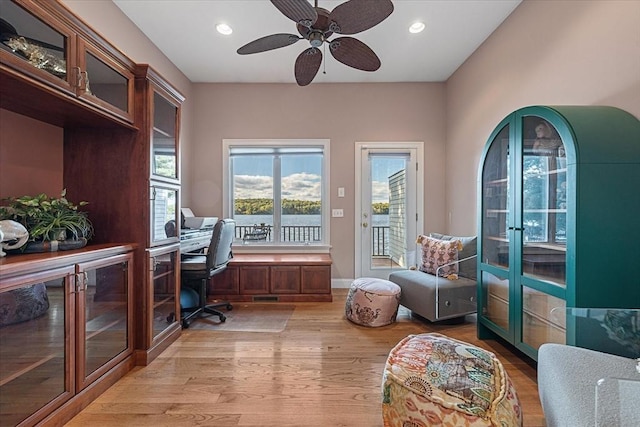 office area featuring light wood-style floors, a ceiling fan, french doors, and recessed lighting