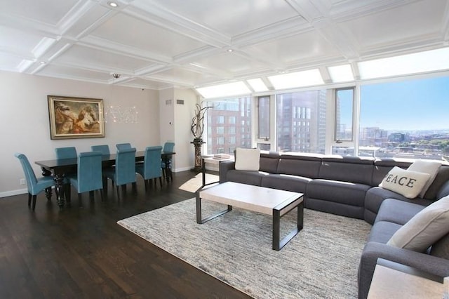 living room with baseboards, wood finished floors, coffered ceiling, plenty of natural light, and beam ceiling