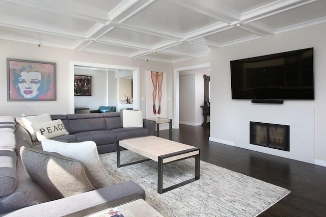 living room with wood finished floors, coffered ceiling, beamed ceiling, a glass covered fireplace, and baseboards