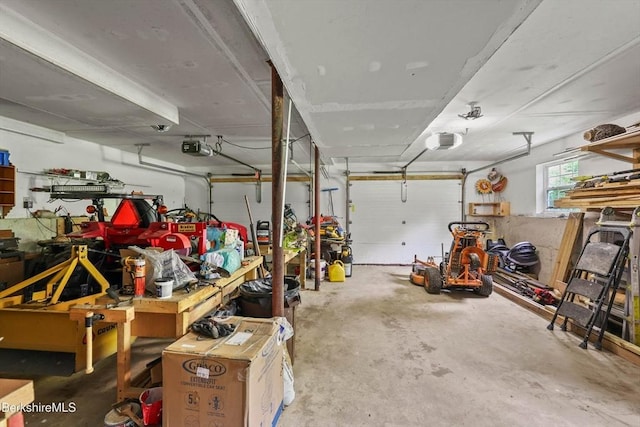 32 Scott Rd, Savoy, MA 01256 - garage with a workshop area and a garage door opener
