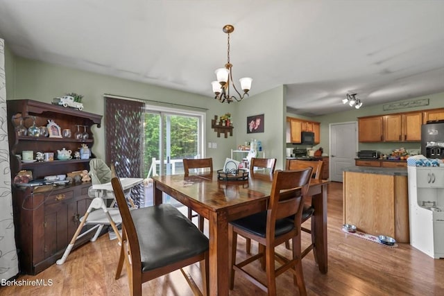 32 Scott Rd, Savoy, MA 01256 - dining area featuring light wood-style floors and a chandelier
