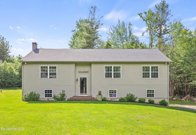 32 Scott Rd, Savoy, MA 01256 - raised ranch with a chimney and a front lawn