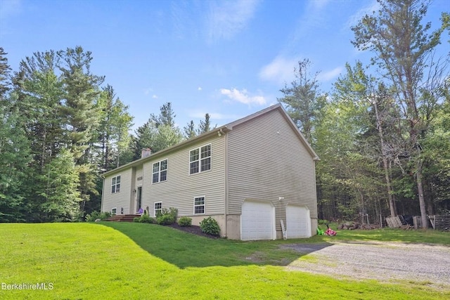 32 Scott Rd, Savoy, MA 01256 - view of front of home featuring an attached garage, a front yard, driveway, and a chimney