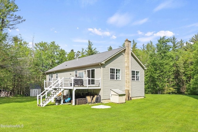 32 Scott Rd, Savoy, MA 01256 - back of house with a chimney, stairway, a wooden deck, a yard, and a storage shed