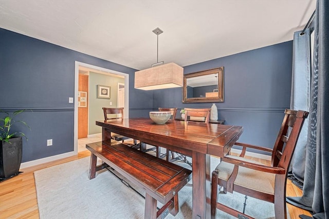 9 Captains Way E, Bridgewater, MA 02333 - dining space with light wood-style flooring and baseboards