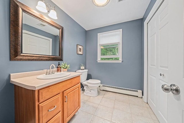 9 Captains Way E, Bridgewater, MA 02333 - bathroom with baseboard heating, vanity, and tile patterned flooring