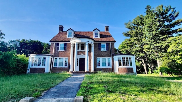 view of front of home with a front yard