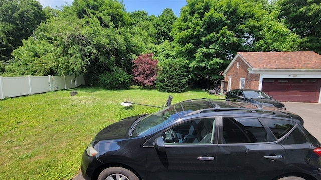 view of yard featuring a garage