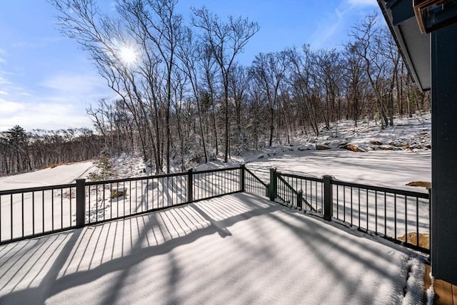 view of snow covered deck