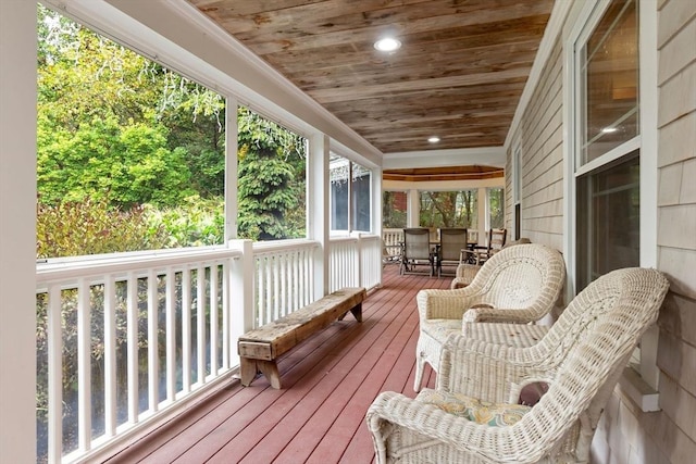 deck with outdoor dining space