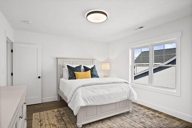 25 Salisbury Hill Blvd Unit 62, Worcester, MA 01609 - bedroom featuring baseboards, visible vents, and wood finished floors