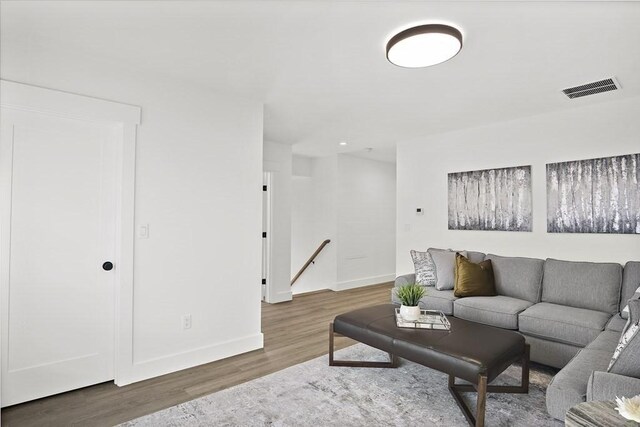 25 Salisbury Hill Blvd Unit 62, Worcester, MA 01609 - living area featuring visible vents, wood finished floors, and baseboards