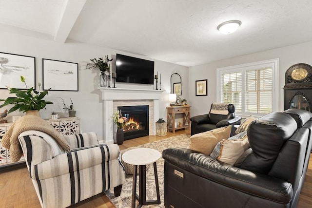 187 Run Brook Cir, Taunton, MA 02780 - living area featuring a tile fireplace and wood finished floors