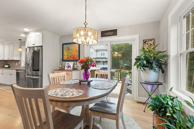 187 Run Brook Cir, Taunton, MA 02780 - dining area featuring plenty of natural light, a chandelier, light wood-style floors, and recessed lighting