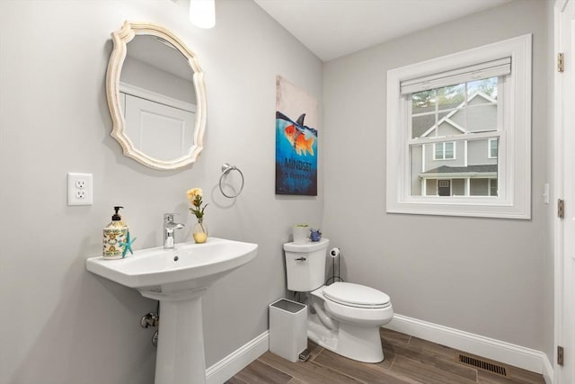 187 Run Brook Cir, Taunton, MA 02780 - half bathroom with baseboards and wood finished floors