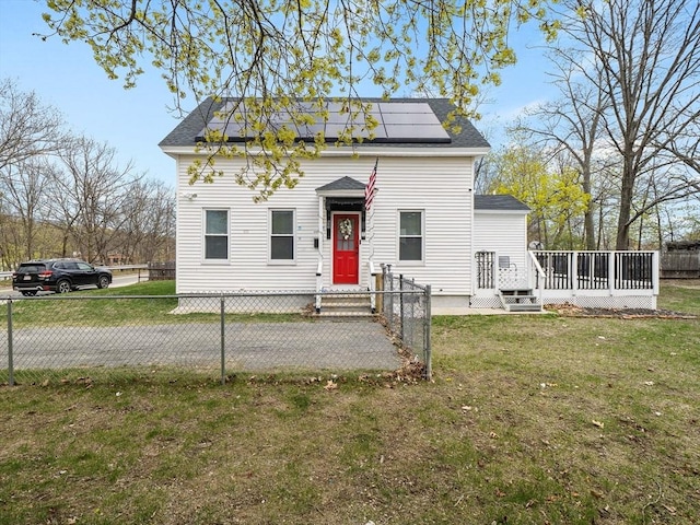 73 Laurel St, Leominster, MA 01453 - victorian home with fence private yard, a front lawn, and solar panels