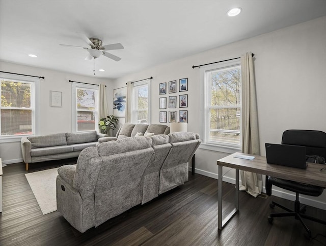 73 Laurel St, Leominster, MA 01453 - living area featuring a healthy amount of sunlight, baseboards, and dark wood-style floors