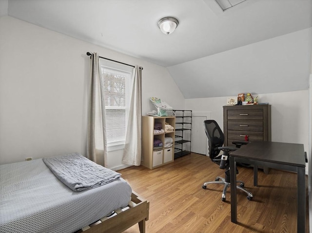 73 Laurel St, Leominster, MA 01453 - bedroom with lofted ceiling and light wood-type flooring