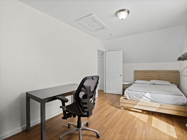 73 Laurel St, Leominster, MA 01453 - bedroom featuring baseboards, vaulted ceiling, and wood finished floors