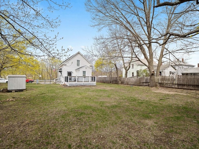 73 Laurel St, Leominster, MA 01453 - view of yard with a fenced backyard, a shed, an outbuilding, and a wooden deck