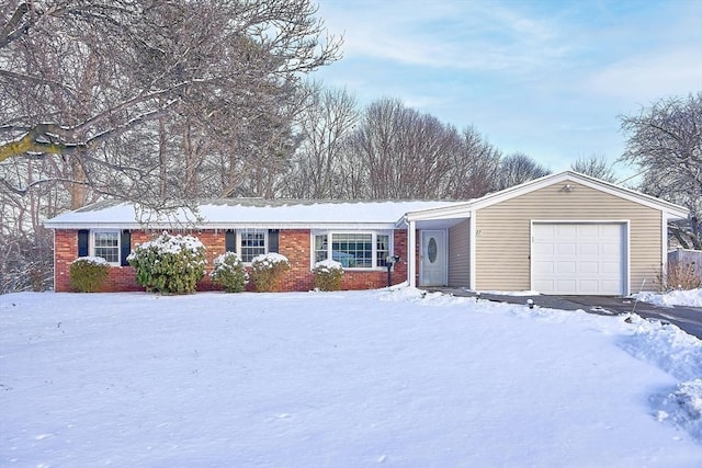 ranch-style house featuring a garage