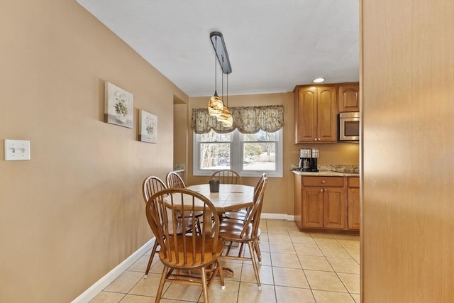 dining room featuring light tile patterned floors