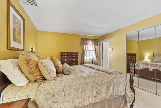 carpeted bedroom featuring a closet