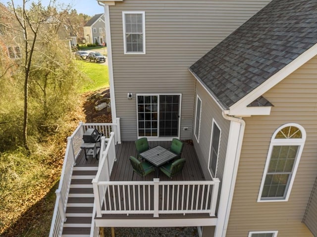 view of side of home featuring a deck