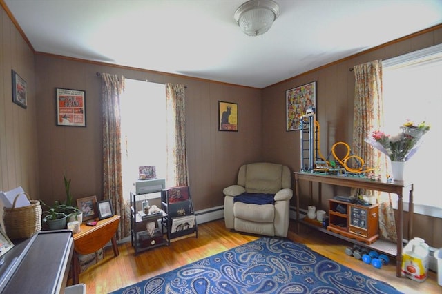 11 Dallas St, Worcester, MA 01604 - sitting room featuring wood finished floors, baseboard heating, and ornamental molding