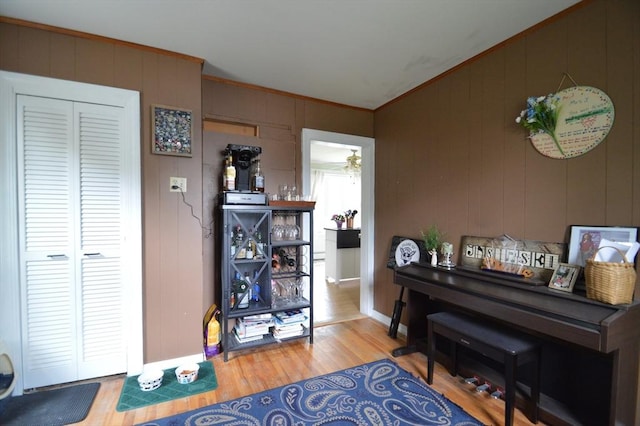 11 Dallas St, Worcester, MA 01604 - sitting room featuring wood finished floors, ornamental molding, and a decorative wall
