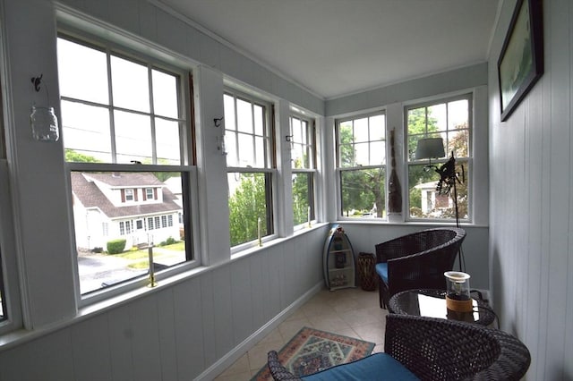 11 Dallas St, Worcester, MA 01604 - sunroom featuring plenty of natural light, tile patterned floors, and wood walls