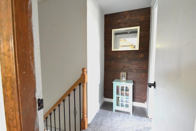 11 Dallas St, Worcester, MA 01604 - hall featuring wood walls, an upstairs landing, carpet floors, and baseboards