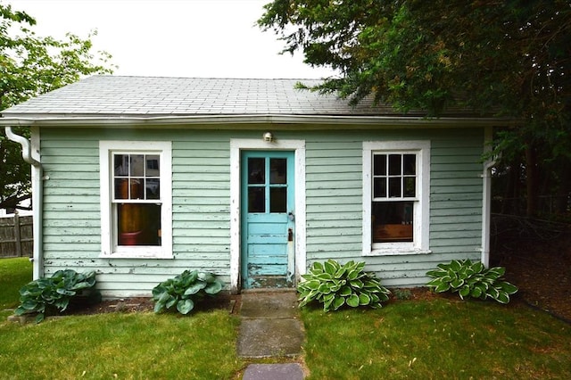 11 Dallas St, Worcester, MA 01604 - view of front of home with a shingled roof