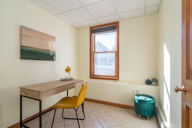 office area featuring light tile patterned flooring and a baseboard heating unit