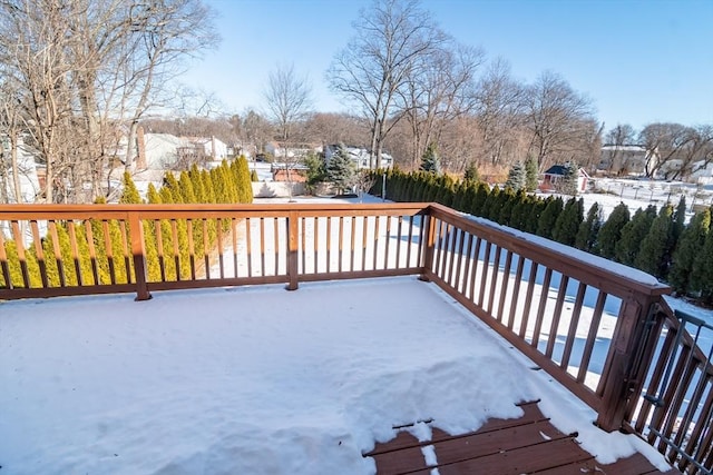 view of snow covered deck