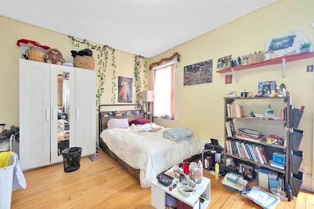 bedroom with light wood-type flooring