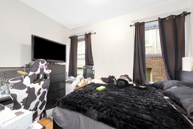 bedroom featuring wood finished floors