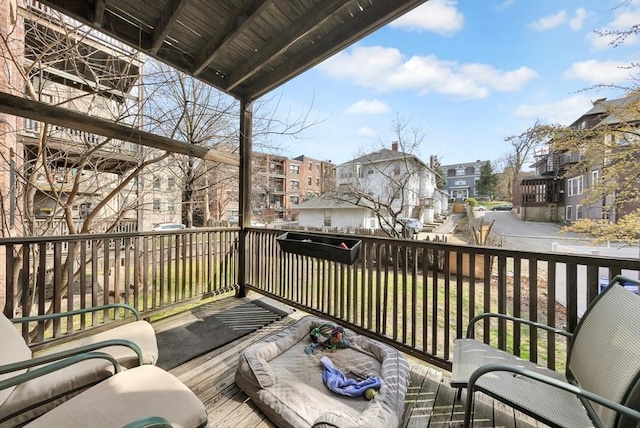 balcony featuring a residential view