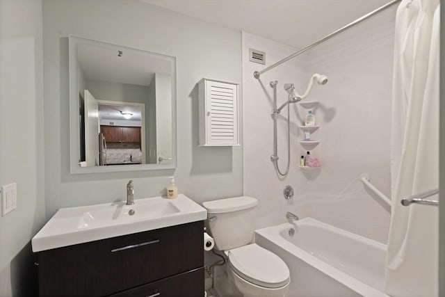 full bathroom with toilet, vanity, and shower / tub combo with curtain