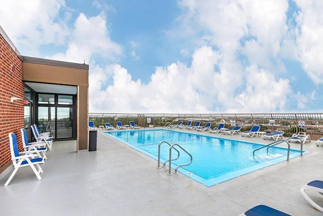 view of pool with a patio