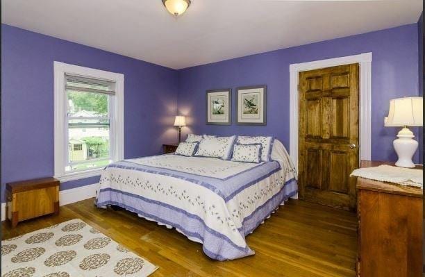 18 Rushmore St, Boston, MA 02135 - bedroom with wood finished floors and baseboards