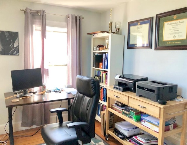 18 Rushmore St, Boston, MA 02135 - office area featuring plenty of natural light and wood finished floors