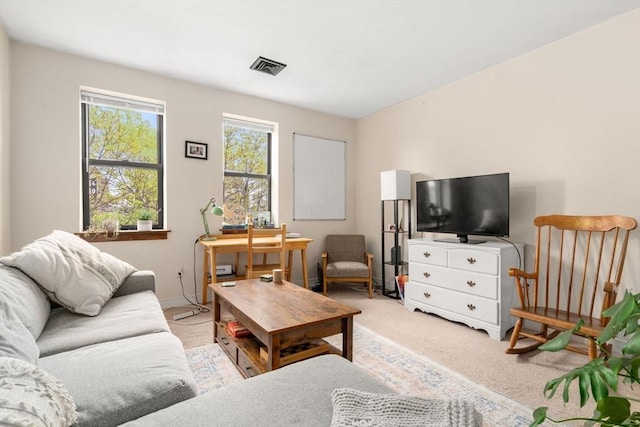 living room featuring light colored carpet