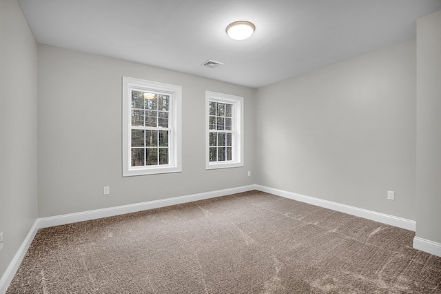 view of carpeted spare room