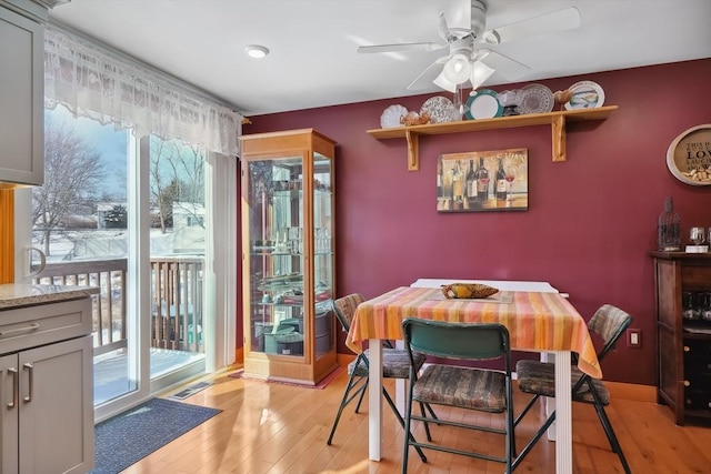 241 Broadway Rd Unit 56, Dracut, MA 01826 - dining space featuring light wood-style floors, plenty of natural light, and ceiling fan