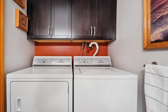 241 Broadway Rd Unit 56, Dracut, MA 01826 - laundry area featuring washing machine and dryer and cabinet space