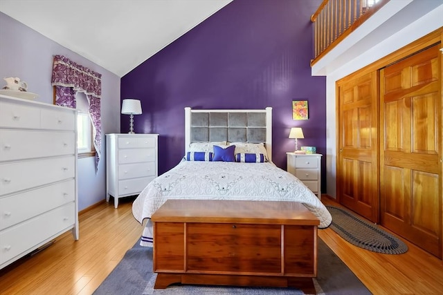241 Broadway Rd Unit 56, Dracut, MA 01826 - bedroom with wood finished floors and high vaulted ceiling