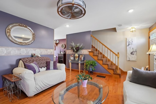 241 Broadway Rd Unit 56, Dracut, MA 01826 - living area with wood finished floors, stairs, and recessed lighting